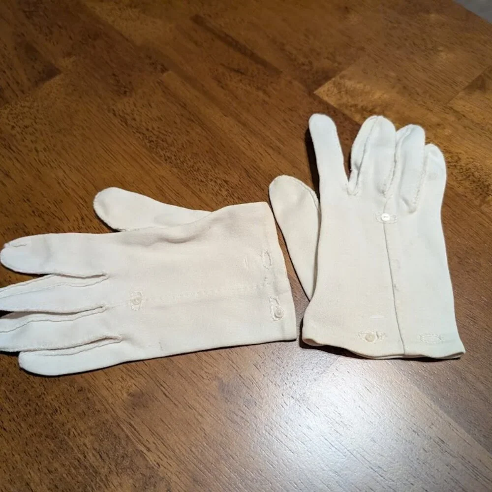 Vintage white wrist length cotton gloves embellished with delicate white buttons